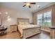 Comfortable bedroom showcasing neutral colors, wood-look flooring, and a large window at 620 Lorenzo Dr. # 620, North Myrtle Beach, SC 29582