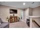 Stylish bonus room showcasing carpet flooring, a TV, and comfortable seating at 620 Lorenzo Dr. # 620, North Myrtle Beach, SC 29582
