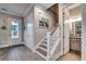 Hallway featuring hardwood floors, access to the bathroom, the stairs and front door at 620 Lorenzo Dr. # 620, North Myrtle Beach, SC 29582