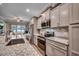 Modern kitchen features stainless steel appliances, granite countertops, tiled backsplash, and cabinetry at 620 Lorenzo Dr. # 620, North Myrtle Beach, SC 29582