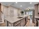 Kitchen featuring granite countertops, stainless steel appliances, and a large island with ample counter space at 620 Lorenzo Dr. # 620, North Myrtle Beach, SC 29582