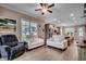 Bright living room featuring wood floors, modern furniture, and a ceiling fan at 620 Lorenzo Dr. # 620, North Myrtle Beach, SC 29582
