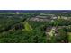 An aerial view of the home nestled amidst lush greenery and near the golf course at 6572 Wellington Dr., Murrells Inlet, SC 29576