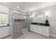 Bright bathroom featuring a glass shower with stylish gray tile and modern fixtures at 6572 Wellington Dr., Murrells Inlet, SC 29576