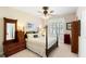 Inviting bedroom with a four-poster bed and natural light at 6572 Wellington Dr., Murrells Inlet, SC 29576