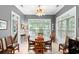 Inviting dining room with a large round table, perfect for Gathering gatherings and entertaining guests at 6572 Wellington Dr., Murrells Inlet, SC 29576