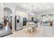 Open kitchen features stainless steel appliances, a functional center island, and seamless flow to the living spaces at 6572 Wellington Dr., Murrells Inlet, SC 29576