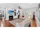 Cozy living room with fireplace, built-in shelves, and comfortable seating at 6572 Wellington Dr., Murrells Inlet, SC 29576