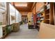 Versatile garage space with built-in shelving, perfect for organization and accommodating a variety of storage needs at 6593 Sunshine St. Nw, Ocean Isle Beach, NC 28469