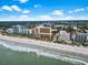 Stunning aerial showcasing beachfront resorts along a pristine coastline at 6900 North Ocean Blvd. # 938, Myrtle Beach, SC 29572