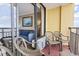 View of the comfortable interiors to the ocean from the relaxing breezy balcony at 6900 North Ocean Blvd. # 938, Myrtle Beach, SC 29572