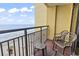 Balcony with oceanfront view and seating provides a relaxing outdoor space with lovely beach vista at 6900 North Ocean Blvd. # 938, Myrtle Beach, SC 29572