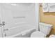 This bathroom features a shower-tub combo and a modern toilet, along with fresh white towels at 6900 North Ocean Blvd. # 938, Myrtle Beach, SC 29572
