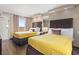 Comfortable bedroom with two beds, soft lighting, and calming decor for a restful stay at 6900 North Ocean Blvd. # 938, Myrtle Beach, SC 29572