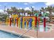 Colorful splash pad and palm trees near resort pool at 6900 North Ocean Blvd. # 938, Myrtle Beach, SC 29572