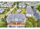 Experience this aerial view showing manicured landscaping, a community pool, and a well-maintained condominium complex at 701 Salleyport Dr. # 1117, Myrtle Beach, SC 29579