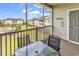 Enjoy the outdoors on this screened balcony with a glass table and chairs, perfect for relaxing and entertaining at 701 Salleyport Dr. # 1117, Myrtle Beach, SC 29579