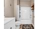 Simple bathroom featuring white vanity, tiled floors and tub with shower at 701 Salleyport Dr. # 1117, Myrtle Beach, SC 29579