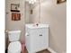 Bathroom with a white vanity, toilet, and decor accents for a welcoming atmosphere at 701 Salleyport Dr. # 1117, Myrtle Beach, SC 29579