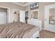 Cozy bedroom with a ceiling fan, flat screen TV, and an attached closet for clothing at 701 Salleyport Dr. # 1117, Myrtle Beach, SC 29579