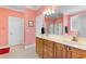 Bathroom features double vanity, tile floors, and walk-in shower at 702 Compass Point Dr., North Myrtle Beach, SC 29582