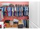 Walk-in closet with extensive shelving and hanging space to maximize storage capacity at 702 Compass Point Dr., North Myrtle Beach, SC 29582