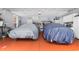 Spacious garage featuring epoxy floors, storage cabinets, and room for two cars at 702 Compass Point Dr., North Myrtle Beach, SC 29582