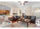 Spacious living room with open concept design, wood floors, and comfortable seating at 702 Compass Point Dr., North Myrtle Beach, SC 29582