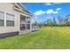 Screened in back porch with view of the back yard at 7377 Pauley Swamp Rd., Conway, SC 29527