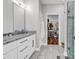 Bathroom featuring double vanity, walk-in shower, and tile floors at 7377 Pauley Swamp Rd., Conway, SC 29527