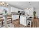 Modern kitchen featuring white cabinets, stainless steel appliances, and a marble countertop island at 7377 Pauley Swamp Rd., Conway, SC 29527