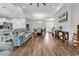 Open-concept living space with hardwood floors, a living room, a dining area, and the kitchen at 7377 Pauley Swamp Rd., Conway, SC 29527