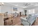 A spacious living room features modern ceiling fan, recessed lights, and stylish furnishings at 7377 Pauley Swamp Rd., Conway, SC 29527
