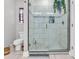 Walk-in shower with decorative tile at 7377 Pauley Swamp Rd., Conway, SC 29527