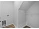 Walk-in closet featuring vinyl flooring and a clothes rack at 776 Nw Palm Frond Way # 55, Calabash, NC 28467