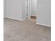 Hallway area with neutral carpet and white walls at 776 Nw Palm Frond Way # 55, Calabash, NC 28467