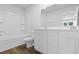 Bright bathroom featuring a tub, toilet, and double sink vanity with ample counter space at 786 Nw Palm Frond Way # 51, Calabash, NC 28467