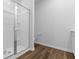 Walk-in shower with clear glass doors at 786 Nw Palm Frond Way # 51, Calabash, NC 28467
