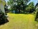 A sprawling backyard with a shed and plenty of space for outdoor activities at 8 Raymond St., Andrews, SC 29510