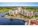 Aerial of a resort complex, highlighting its waterfront location, pool area, and access to golf course and parking at 8121 Amalfi Pl. # 4706, Myrtle Beach, SC 29572