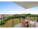 Spacious balcony offers serene waterway views and comfortable seating at 8121 Amalfi Pl. # 4706, Myrtle Beach, SC 29572