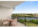 Relaxing balcony with seating and scenic views of the waterway and surrounding landscape at 8121 Amalfi Pl. # 4706, Myrtle Beach, SC 29572