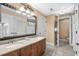 Bathroom featuring a double vanity and large mirror at 8121 Amalfi Pl. # 4706, Myrtle Beach, SC 29572