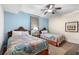Coastal themed bedroom with two beds, side table, and window at 8121 Amalfi Pl. # 4706, Myrtle Beach, SC 29572