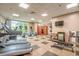Well-equipped fitness center with treadmills, elliptical machines, free weights, a sauna, and water cooler at 8121 Amalfi Pl. # 4706, Myrtle Beach, SC 29572