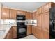 Spacious kitchen boasting modern appliances, wood cabinets, and ample counter space at 8121 Amalfi Pl. # 4706, Myrtle Beach, SC 29572