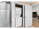 Convenient laundry closet featuring a stacked washer and dryer for efficient space-saving in unit at 8121 Amalfi Pl. # 4706, Myrtle Beach, SC 29572