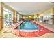 This indoor pool is long and narrow with a 3-foot depth and is surrounded by lounge chairs at 8121 Amalfi Pl. # 7-805, Myrtle Beach, SC 29572