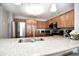 Well-equipped kitchen featuring stainless steel appliances and granite countertops at 8121 Amalfi Pl. # 7-805, Myrtle Beach, SC 29572