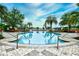 The resort-style pool offers plenty of space to relax with many lounge chairs, umbrellas and greenery at 8121 Amalfi Pl. # 7-805, Myrtle Beach, SC 29572